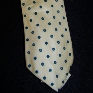 Christopher Hayes cream colored tie
